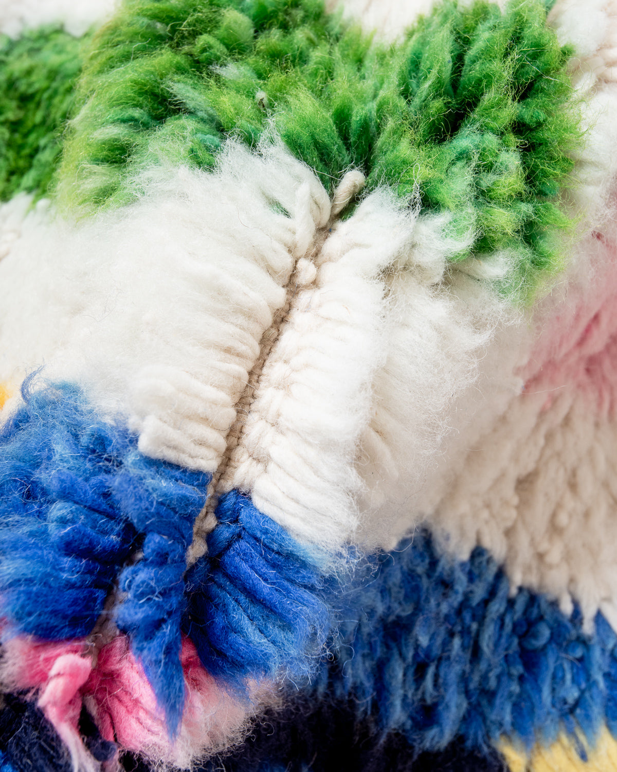 Modern, designer, handcrafted Berber rug from Morocco. Beniourain carpet with beautiful colours and patterns and fluffy wool texture.